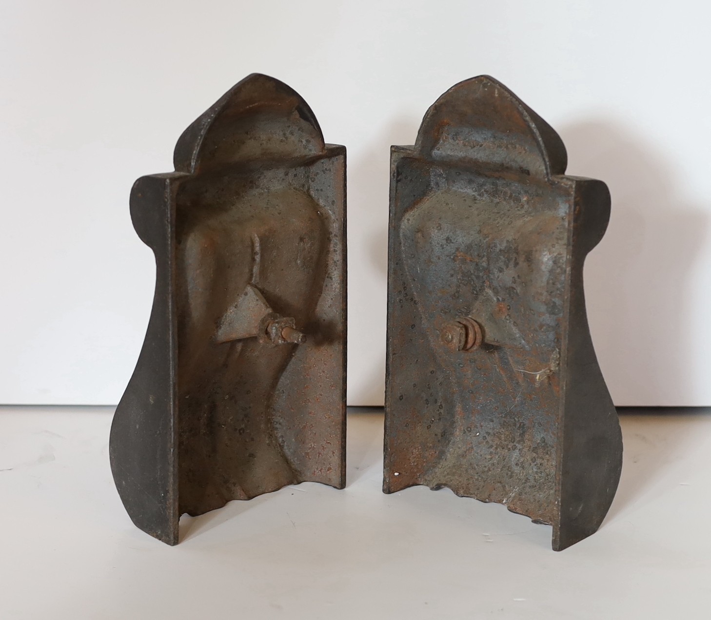 A pair of Victorian cast iron corbels and a pair of carved white marble corbels, height 26cm & 35cm